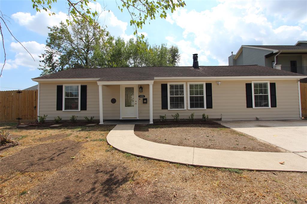 a front view of a house with yard