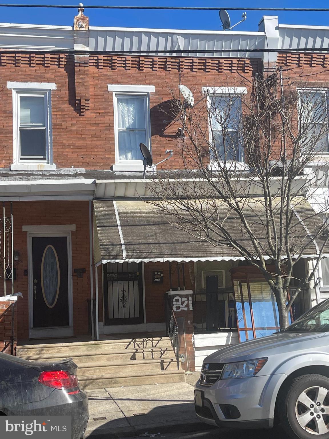 a front view of a house with parking