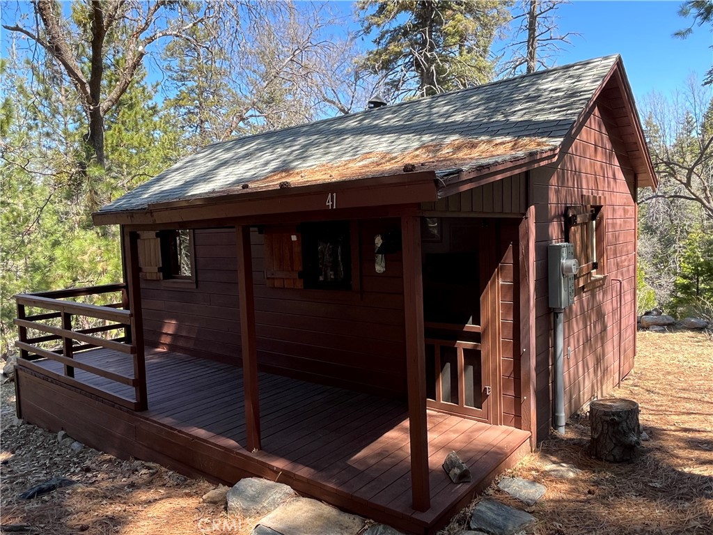 Front of cabin in the morning sun