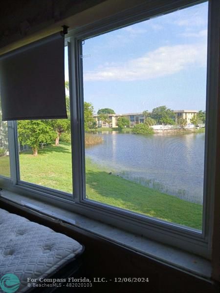 a view of a lake from a window