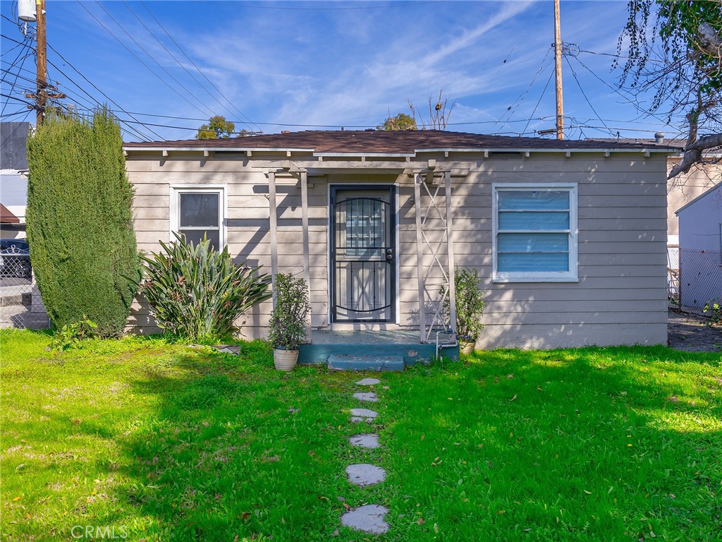 a view of a house with a garden