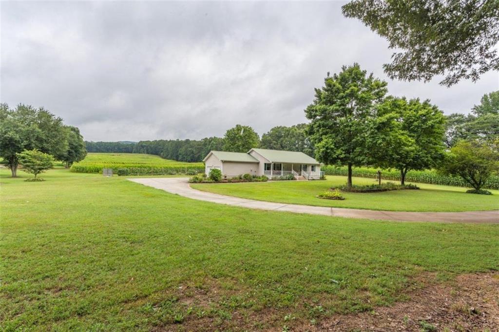 a view of a house with a big yard