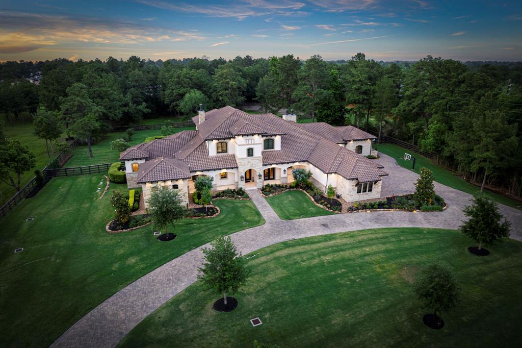 an aerial view of a house with garden