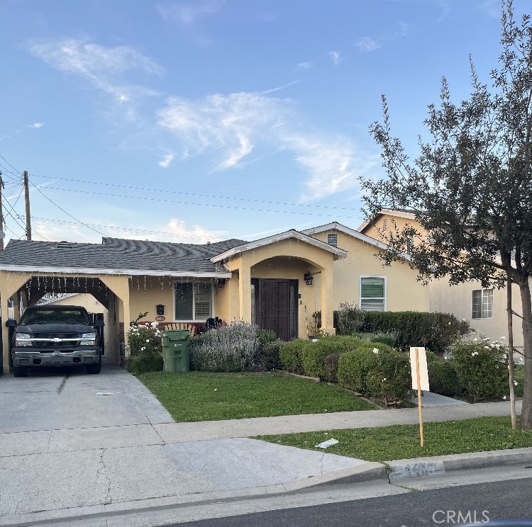 a car parked in front of a house