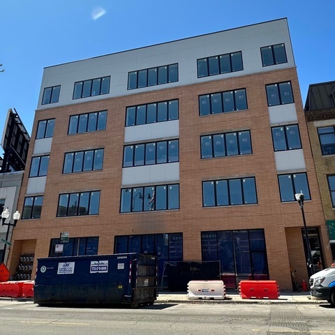 a view of front red brick building