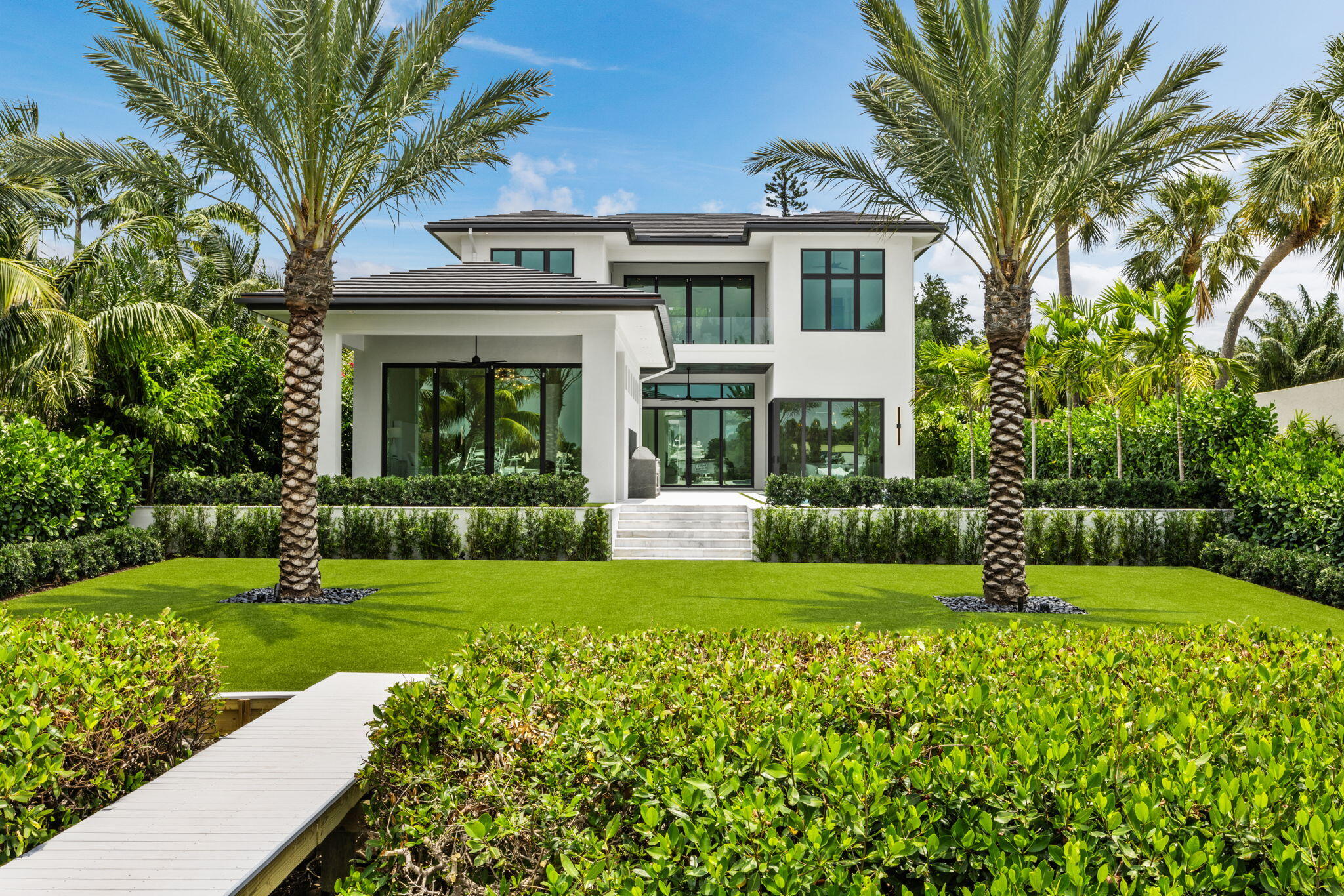 a view of a house with a garden