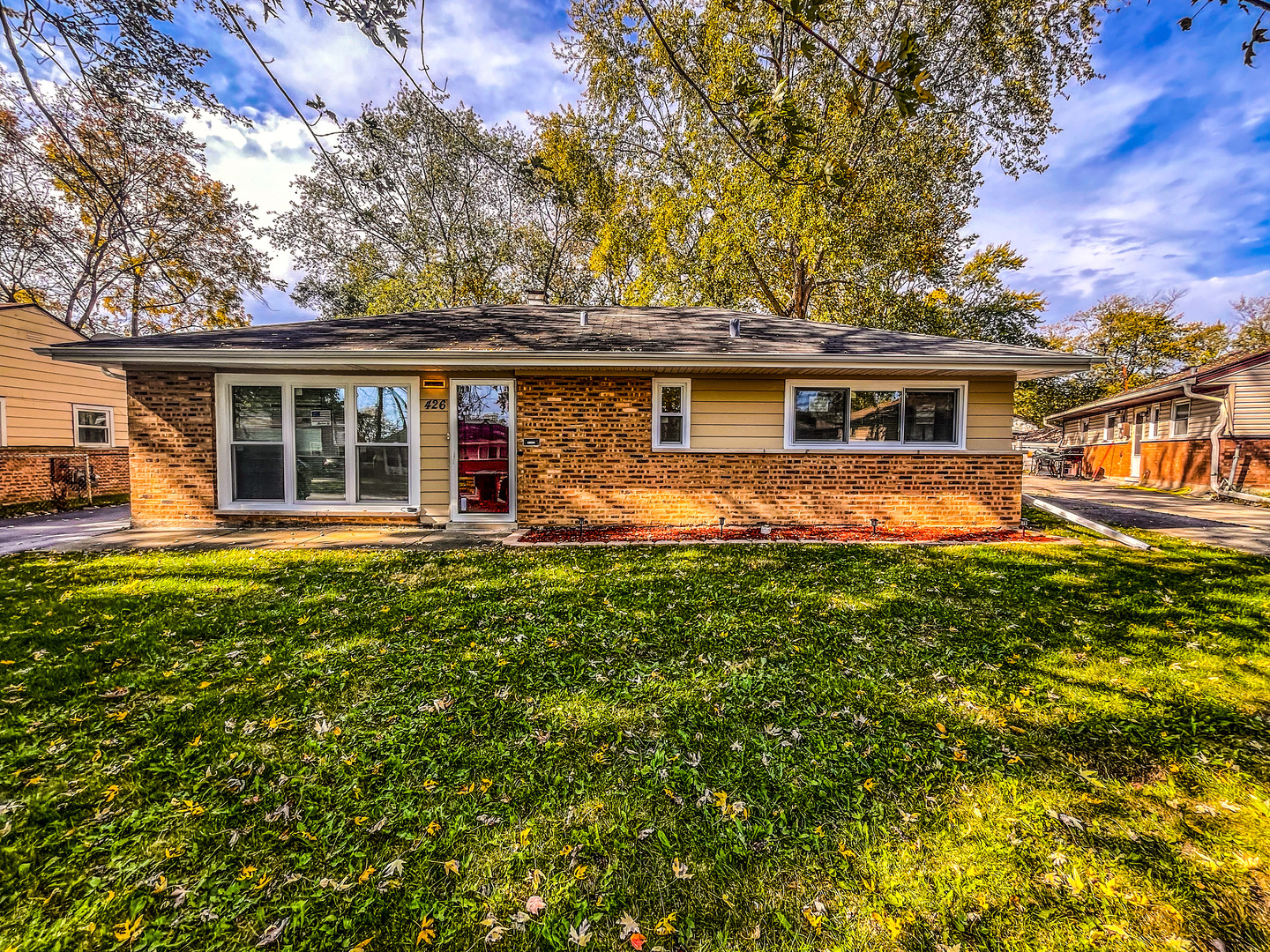 front view of house with a yard