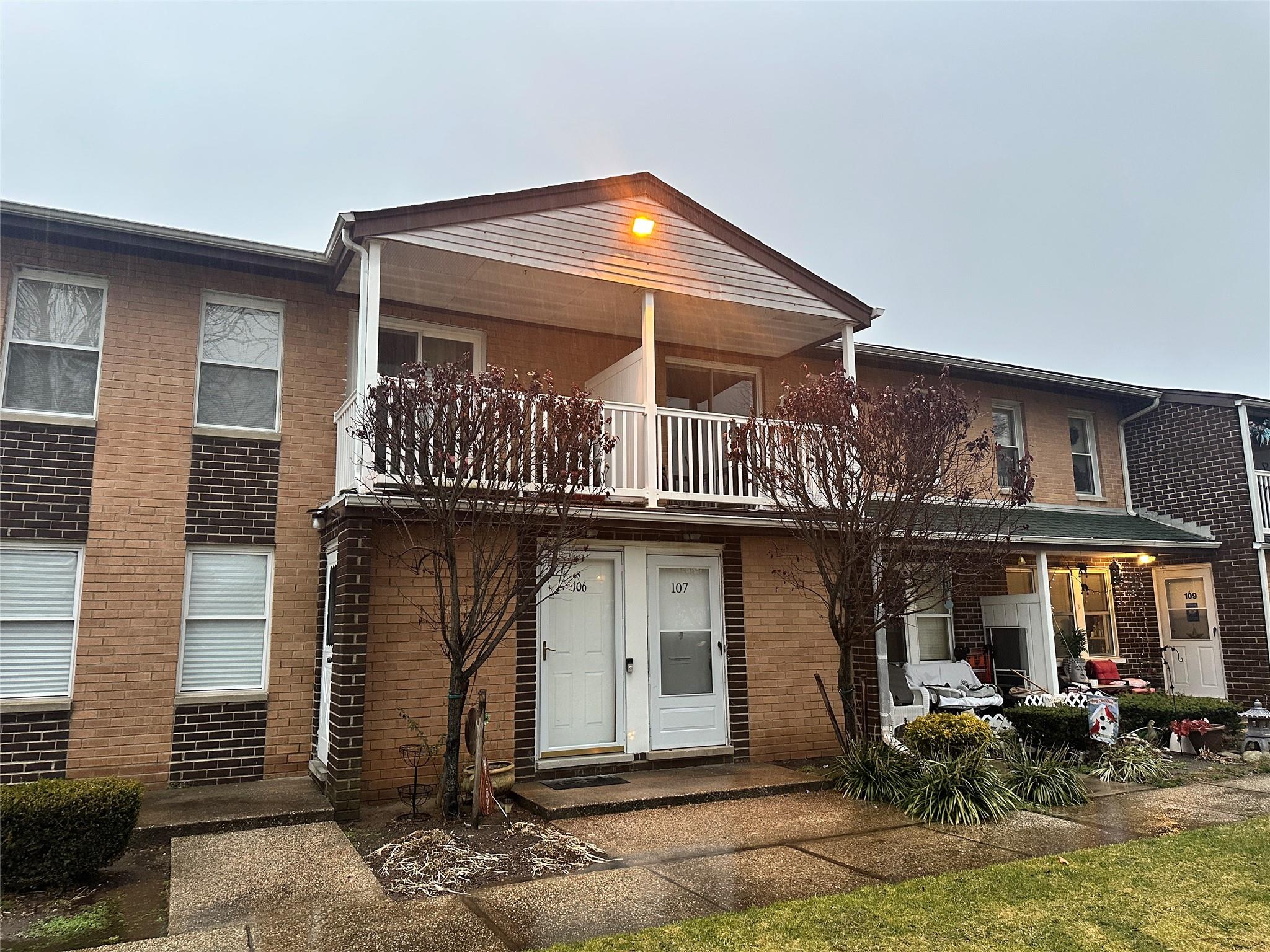 View of front of home with a balcony