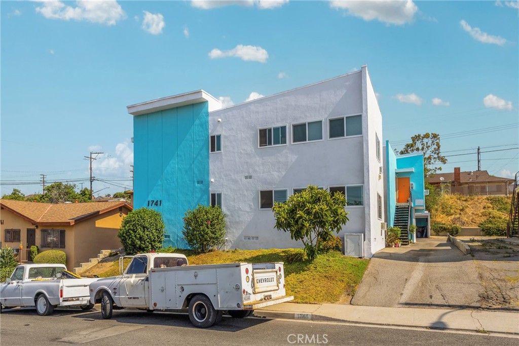 a car parked in front of a building