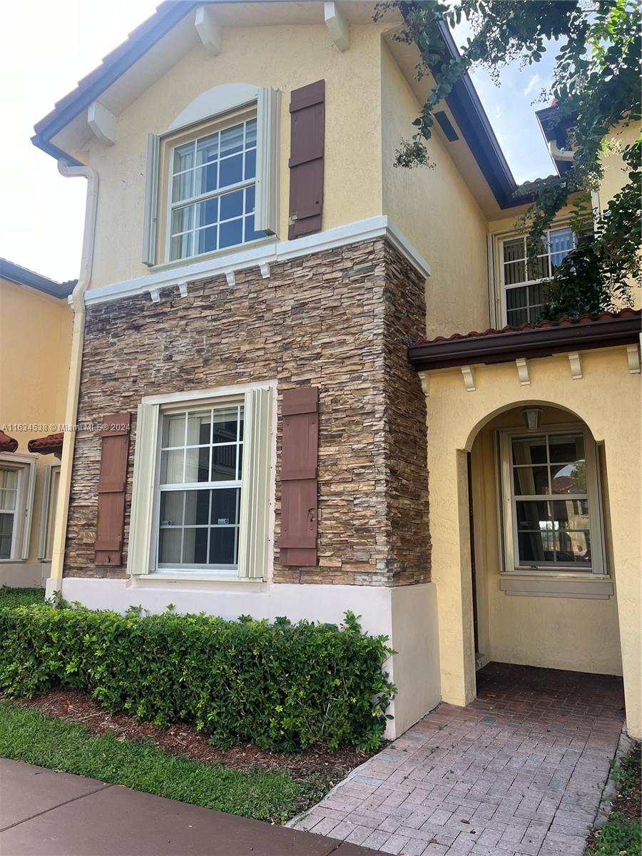 a front view of a house with balcony