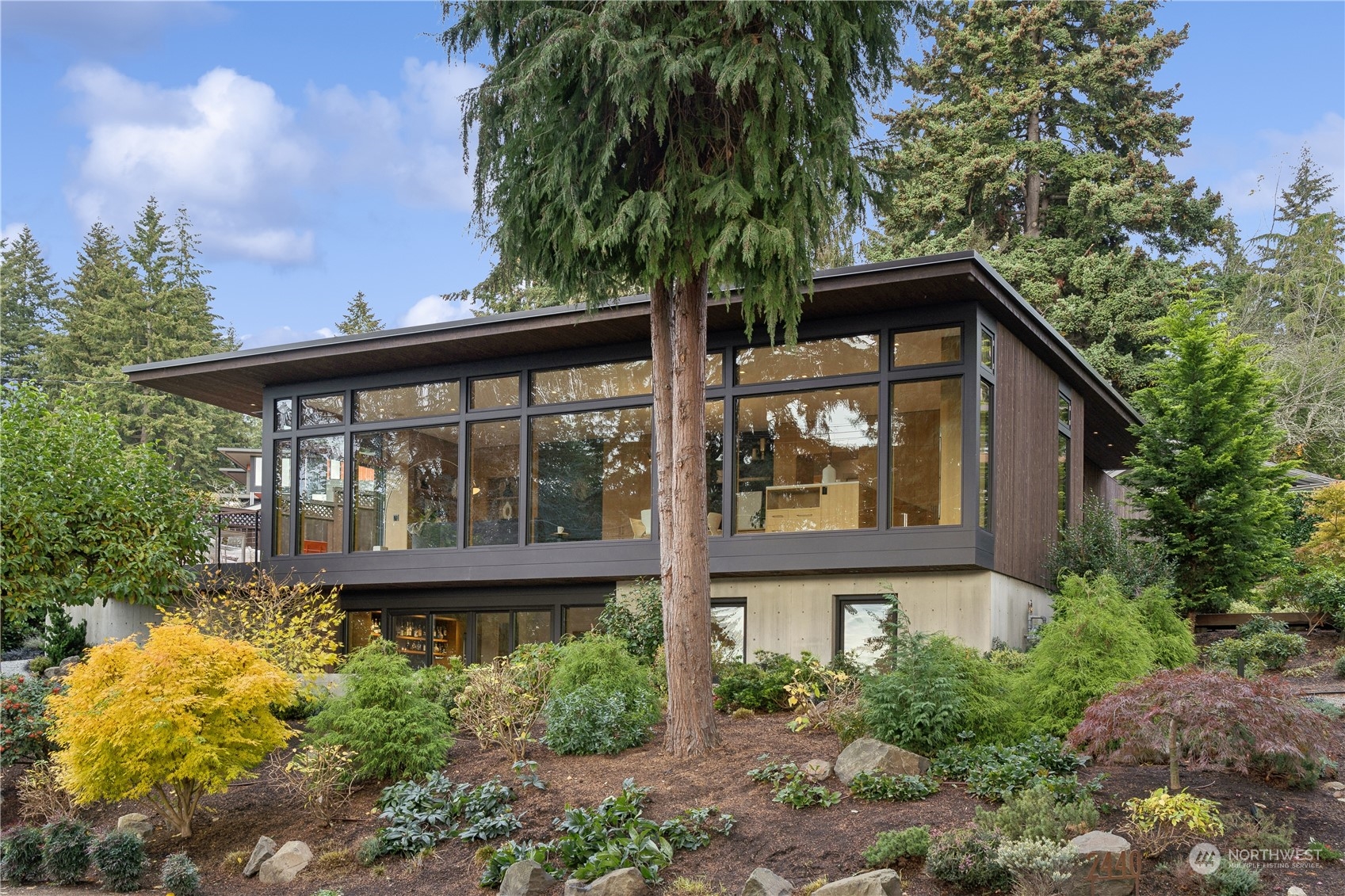 front view of a house with a garden