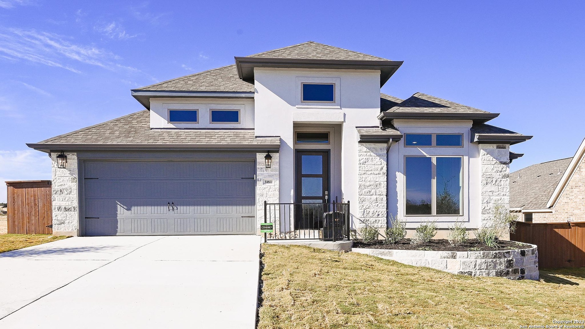 a house view with a outdoor space