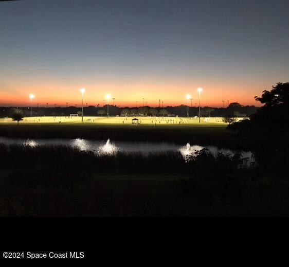 a view of a lake from a yard