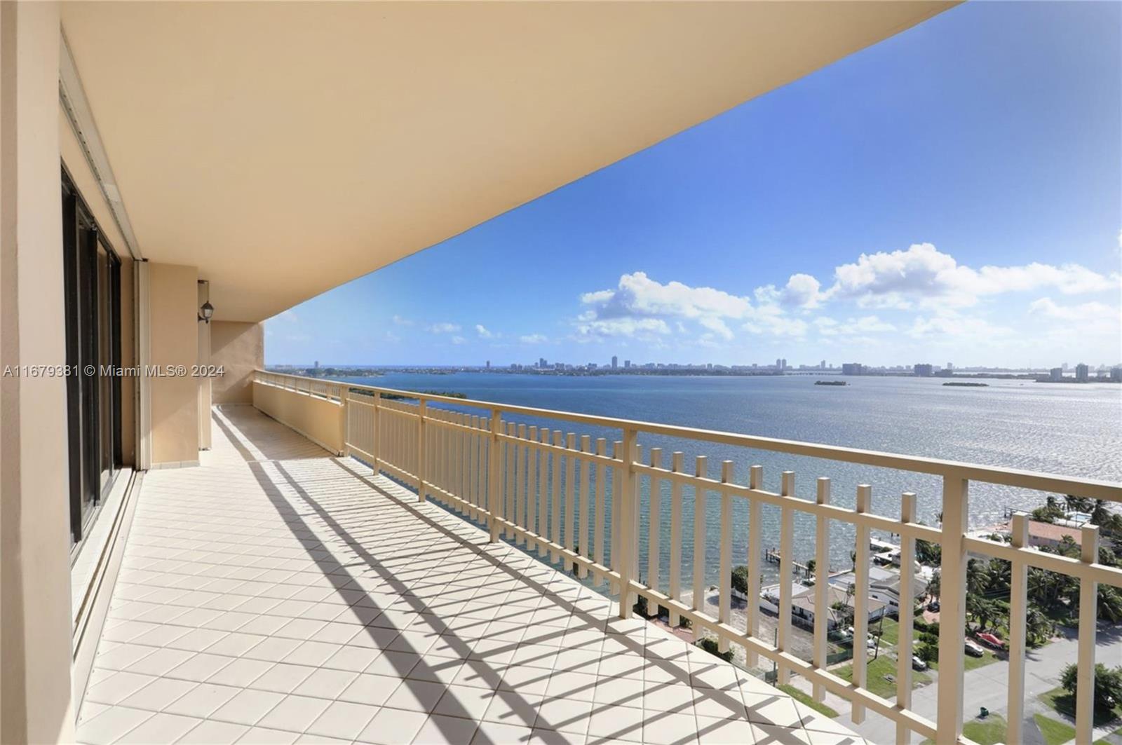 a view of balcony with furniture