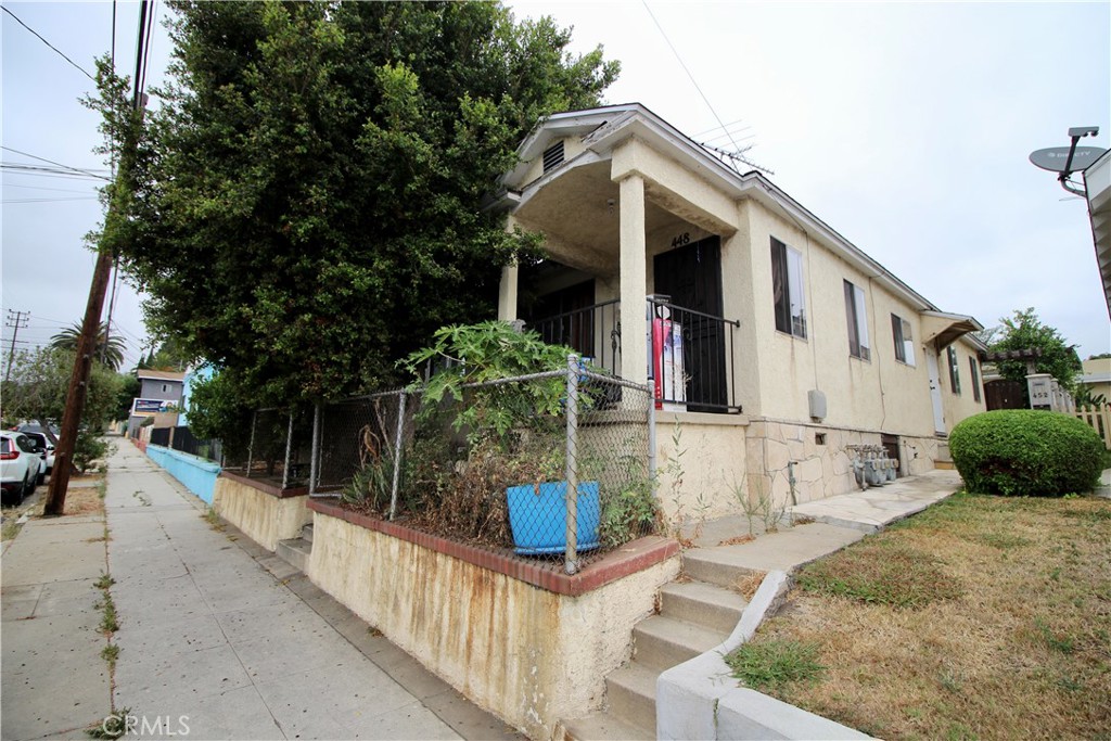 a front view of a house with patio