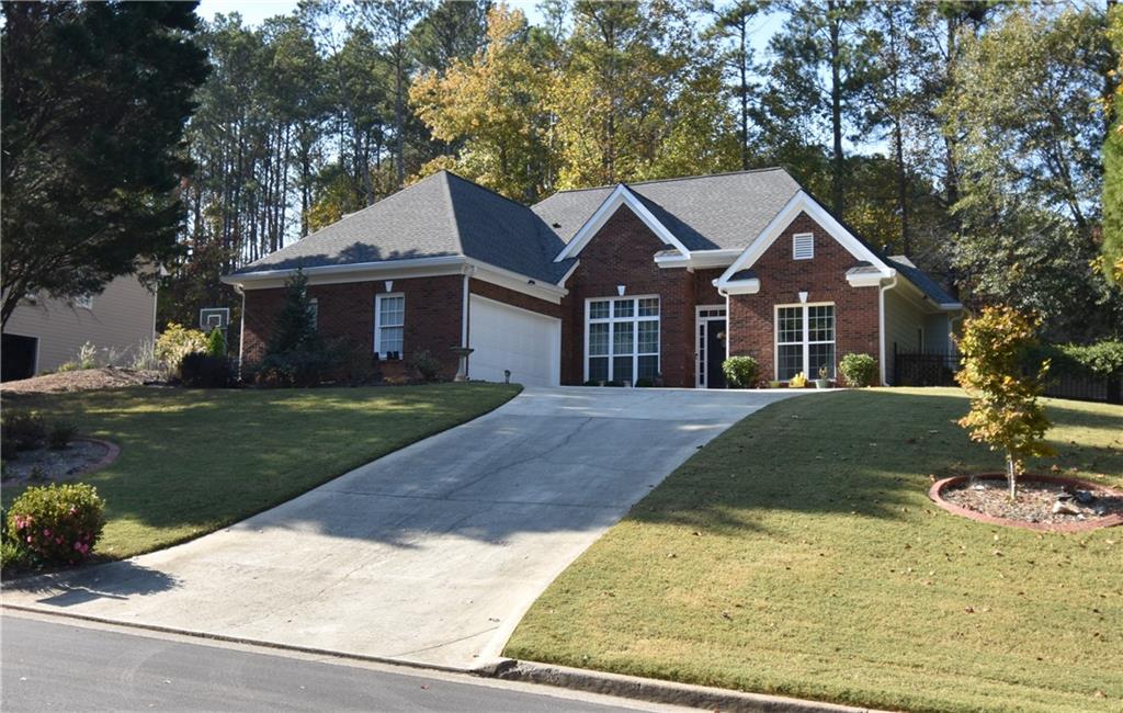 front view of a house with a yard