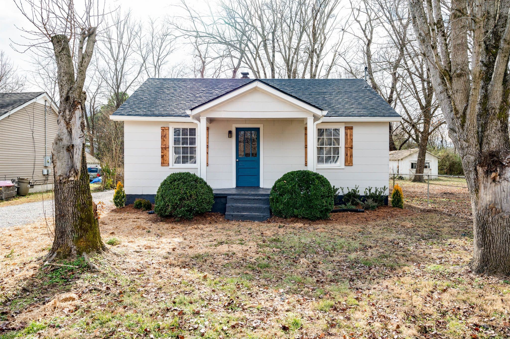 a front view of a house with a yard