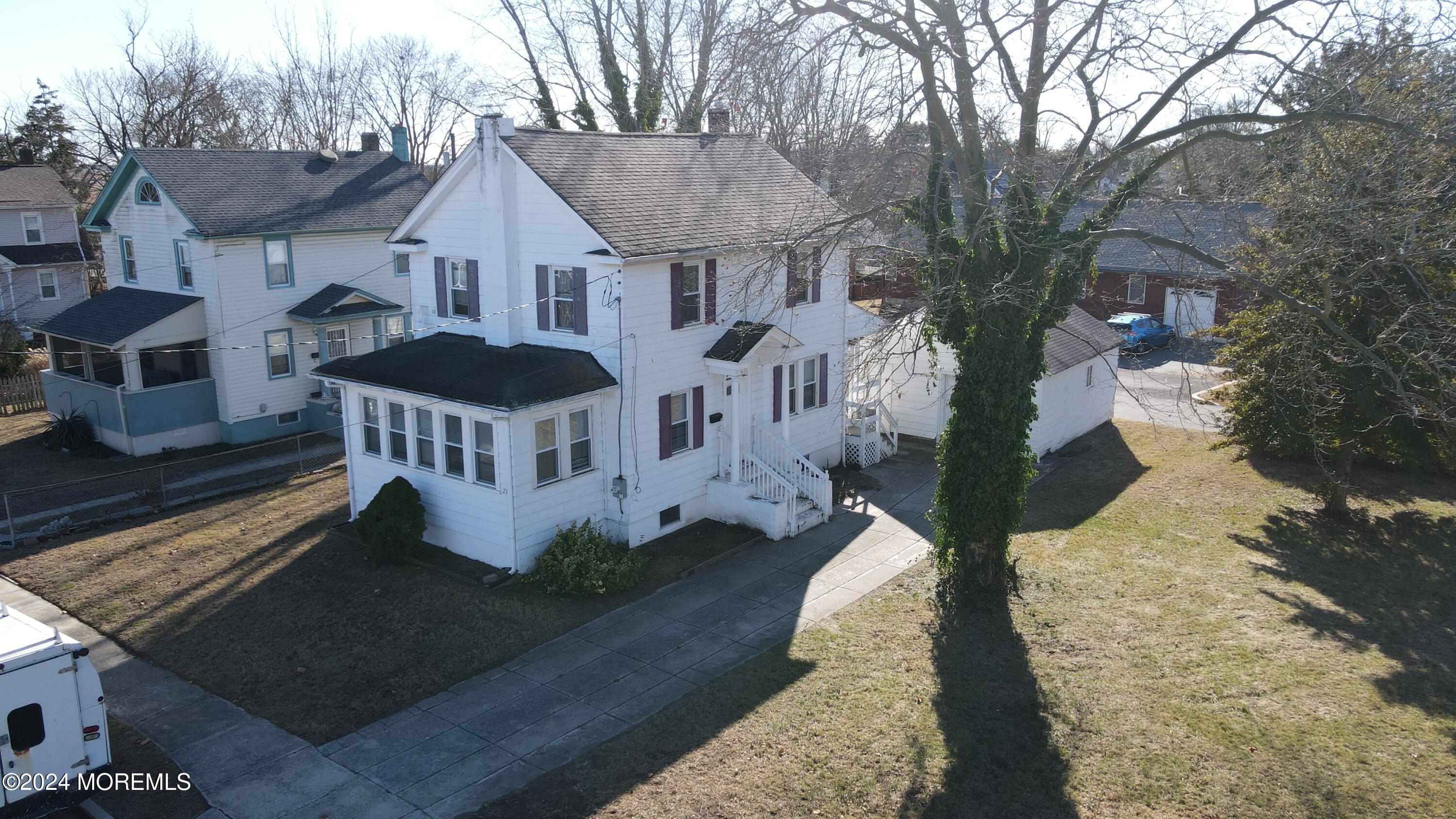 a house with trees in front of it