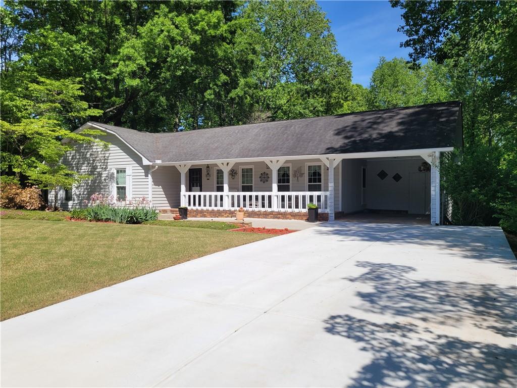 front view of a house with a yard