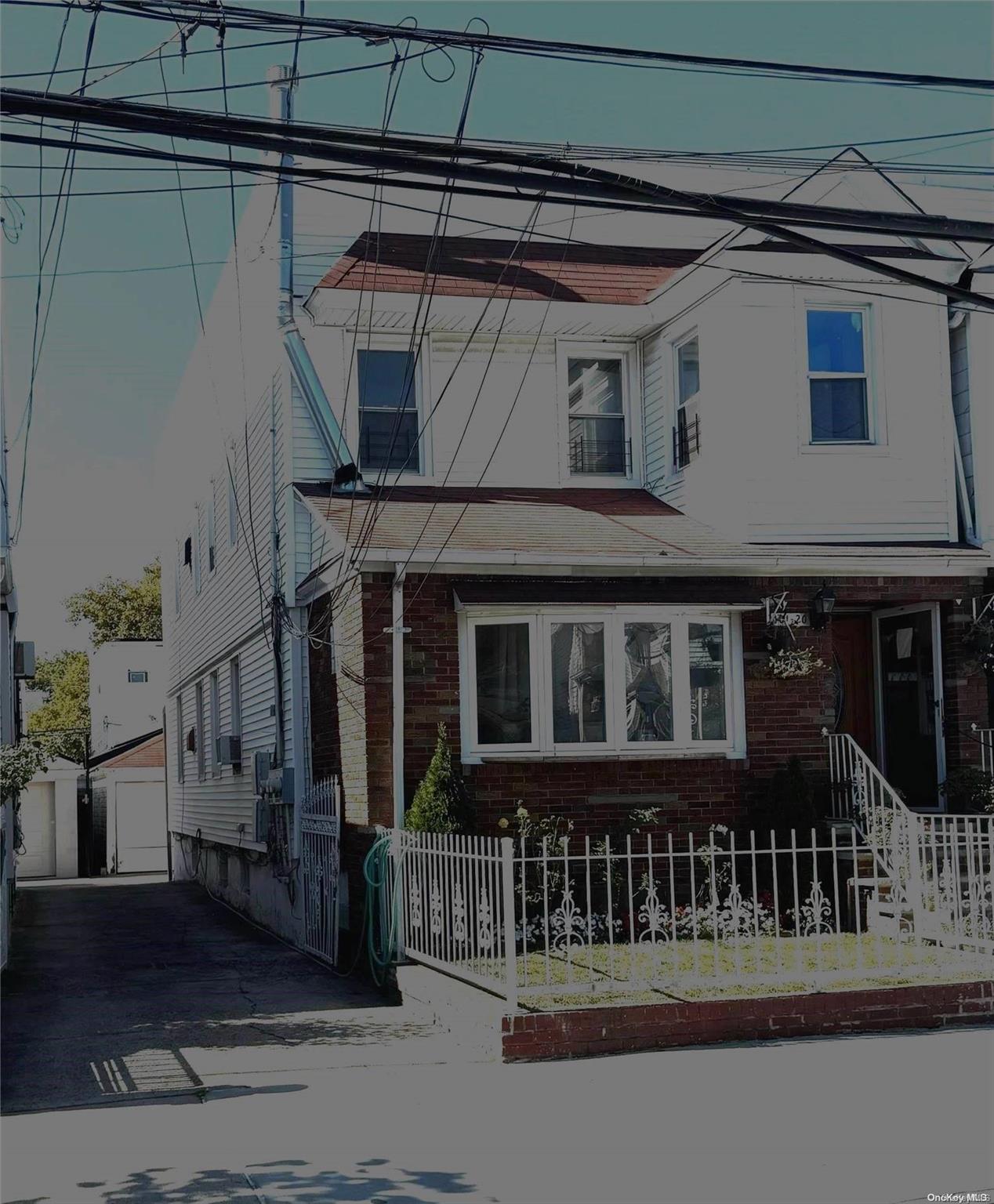 a front view of a house with glass windows