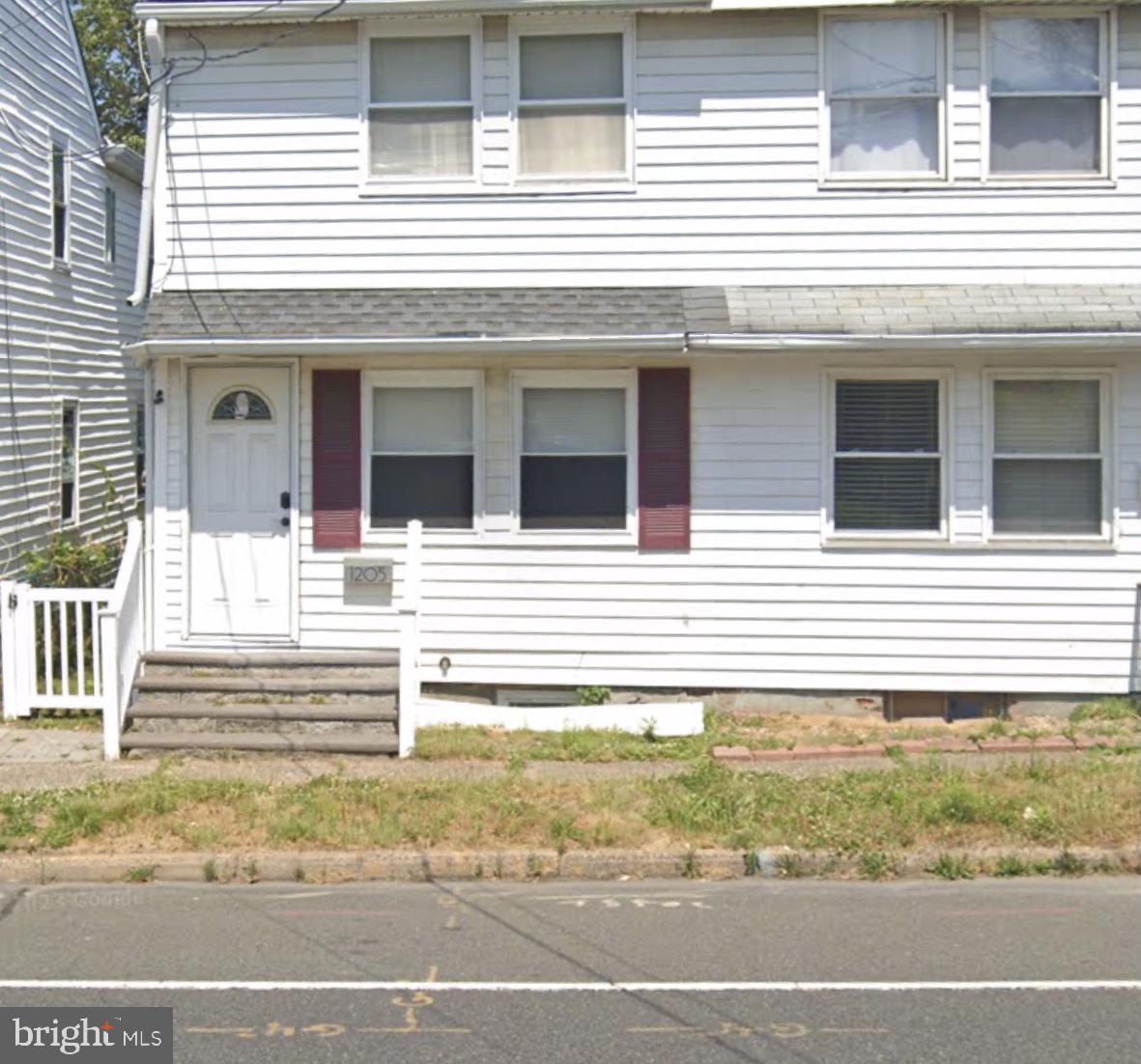 a view of a house with a balcony