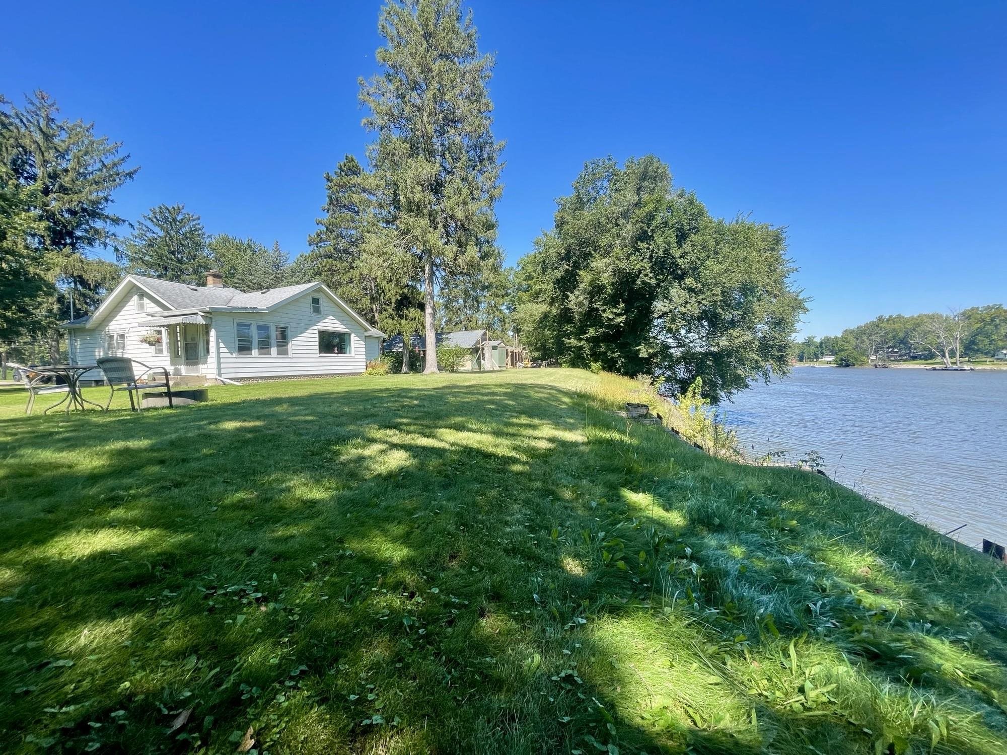 a view of a house with a big yard