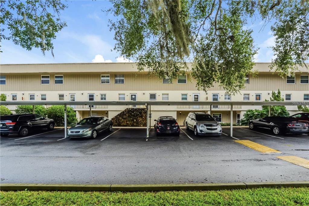 a view of a cars parked in front of a building