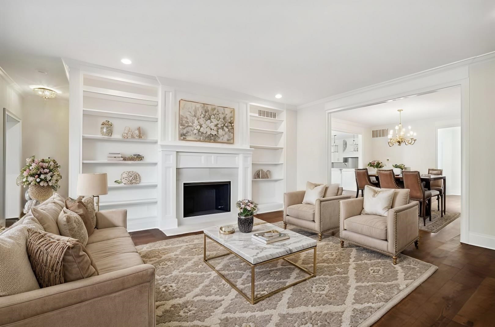 a living room with furniture fireplace and window