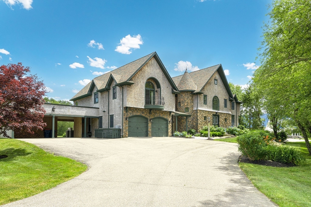 a view of house with yard