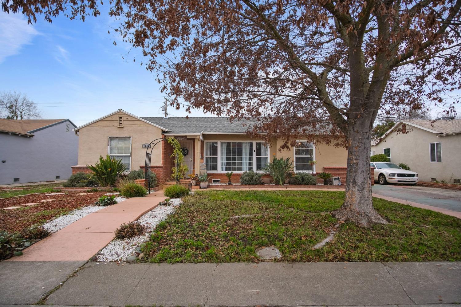 front view of a house with a yard