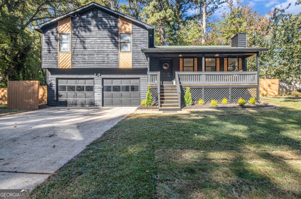 front view of a house with a yard