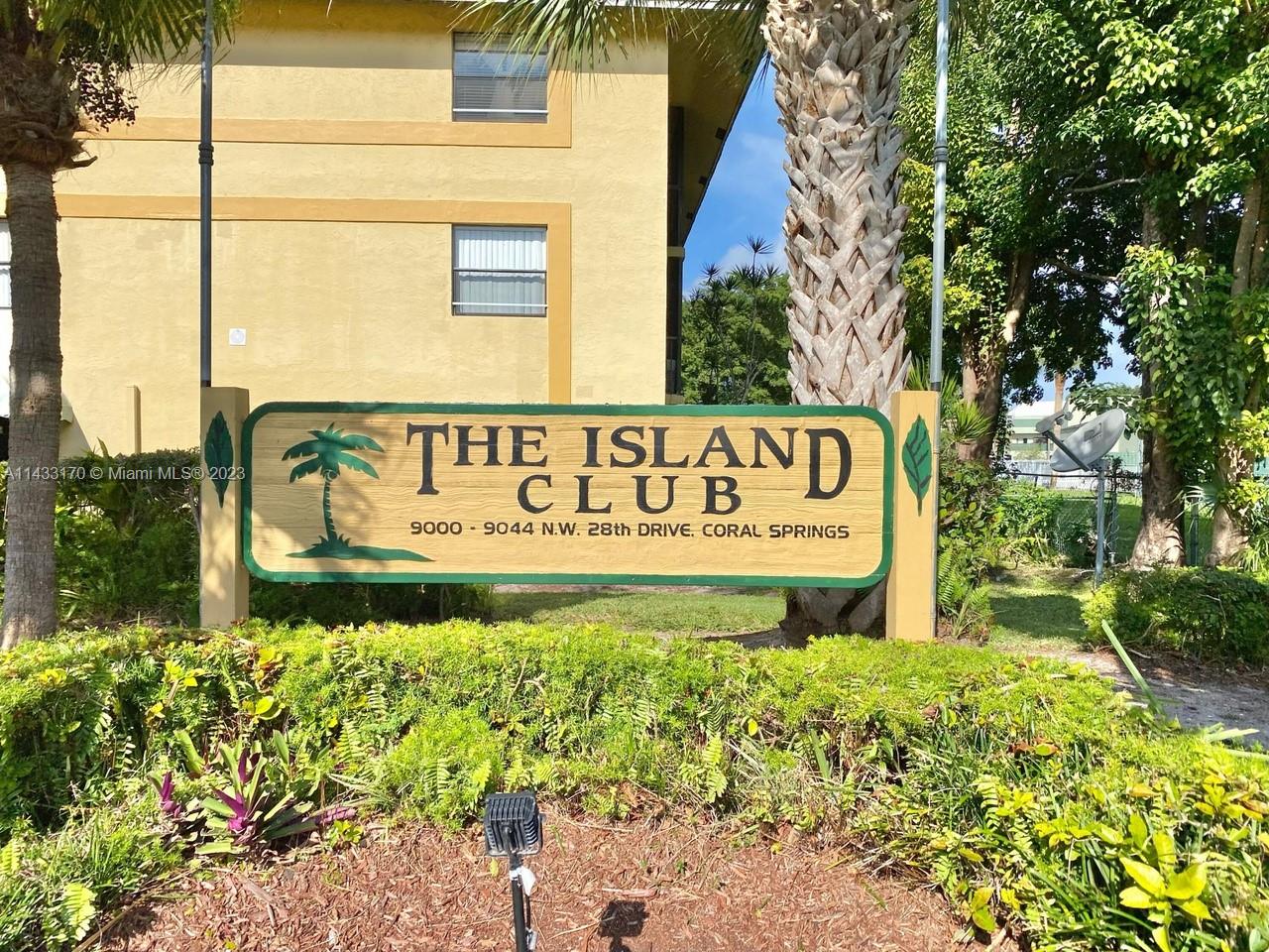 a sign broad in front of a building