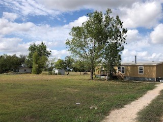 a view of an outdoor space and yard