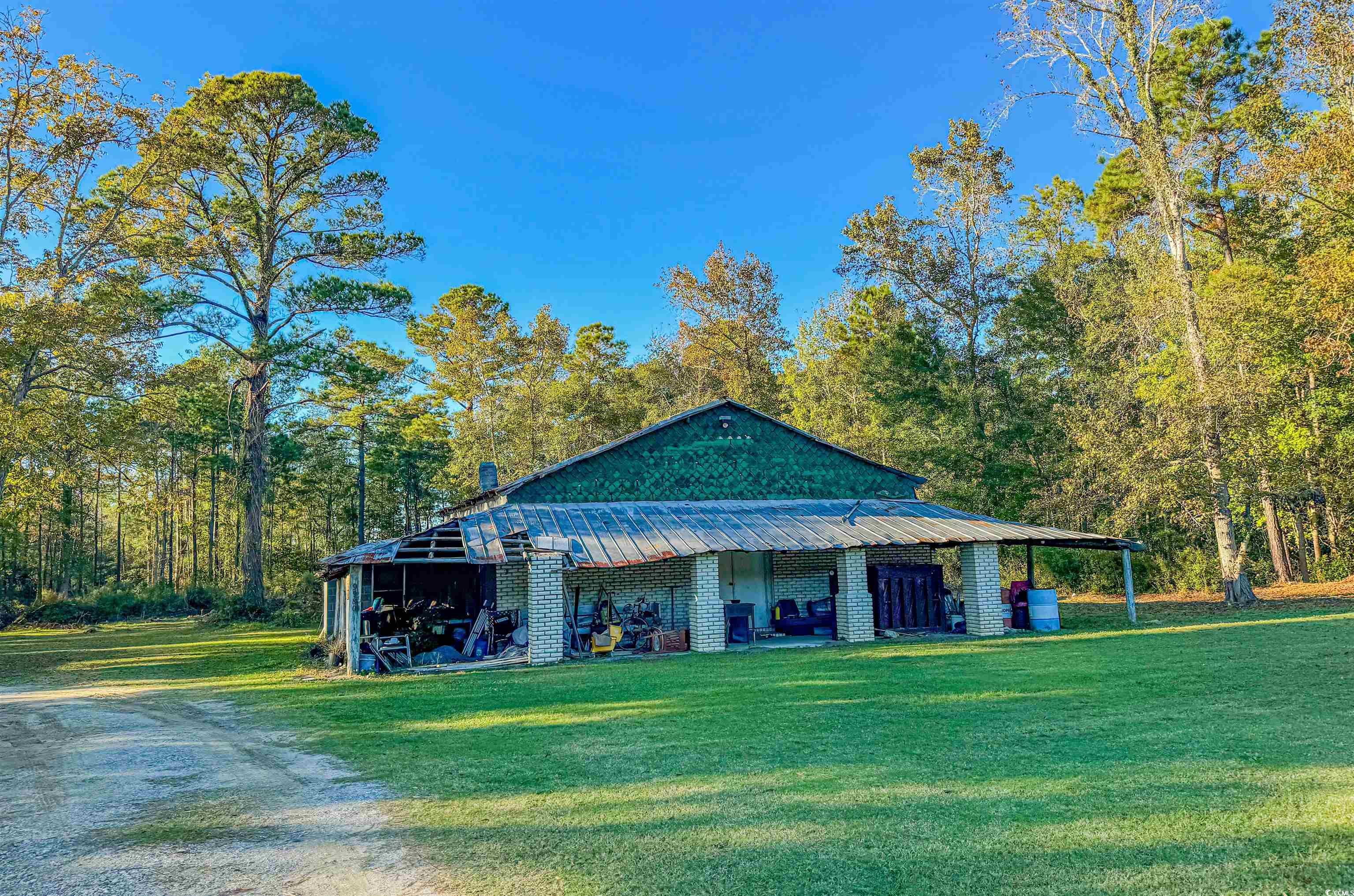 Exterior space featuring a yard