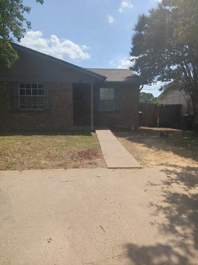 a view of a backyard of the house