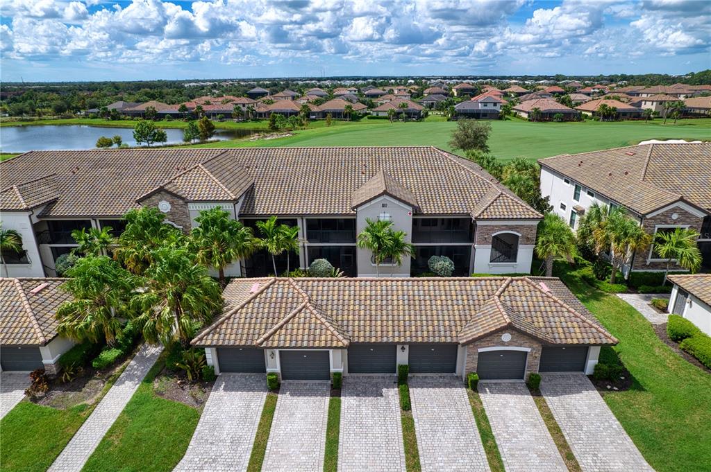 an aerial view of a house with a garden