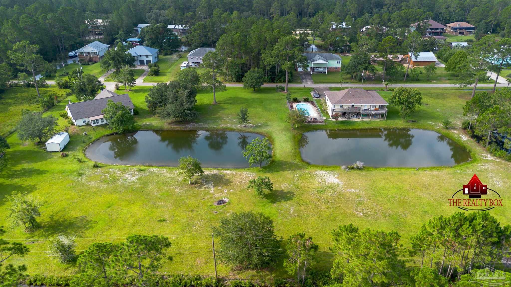 a view of a lake with houses