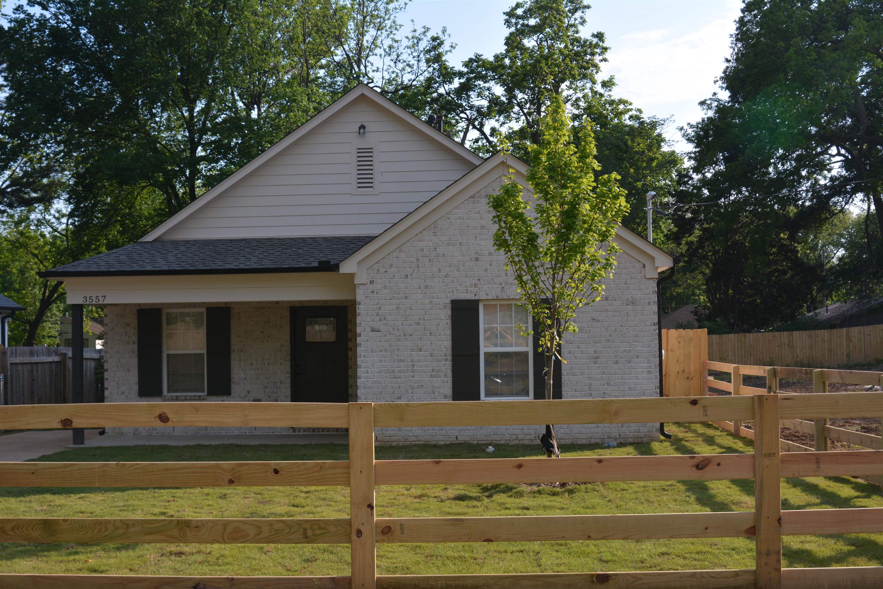 a view of a house with a swimming pool