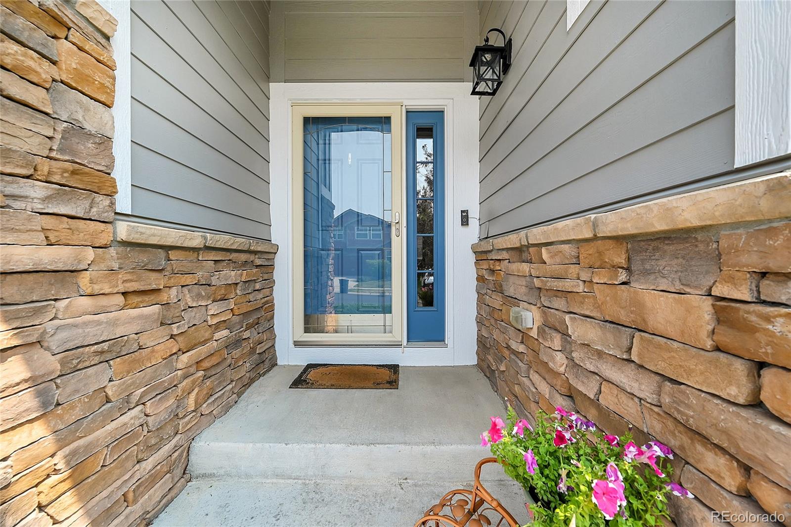 a view of door with wooden walls