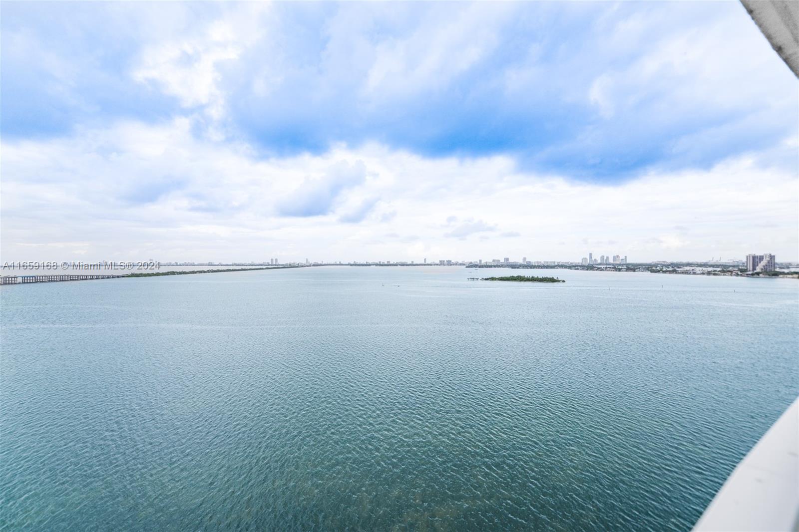 a view of a lake from a yard