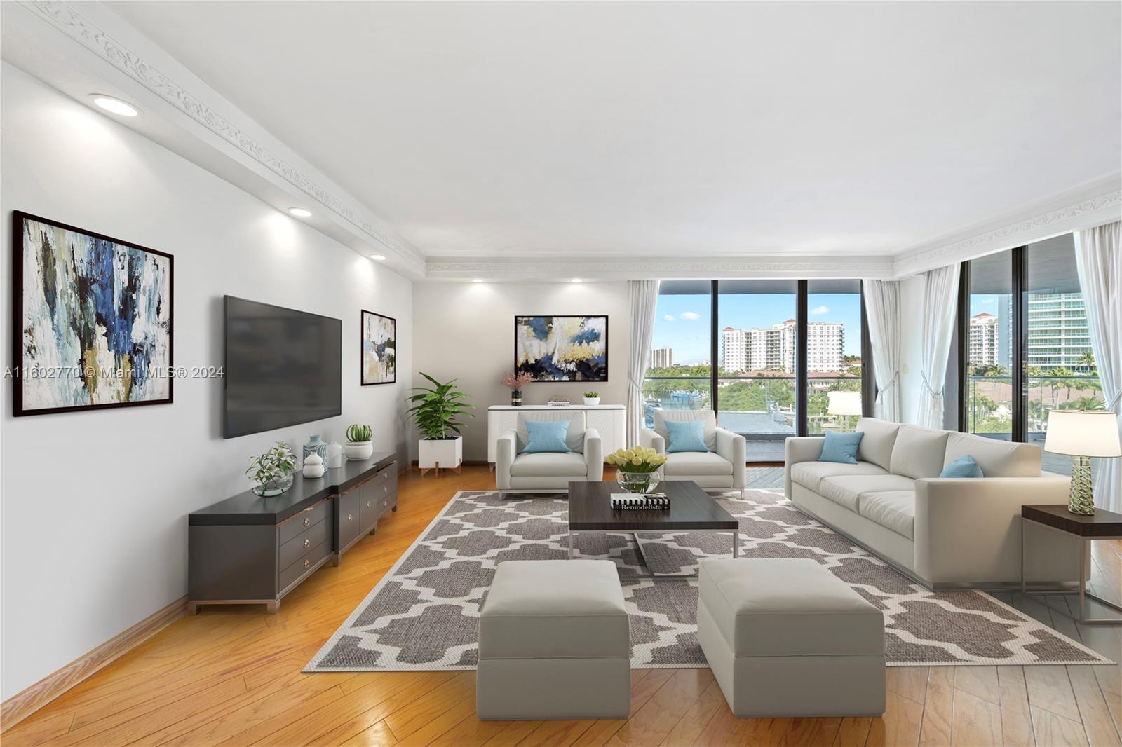 a living room with furniture flat screen tv and a large window