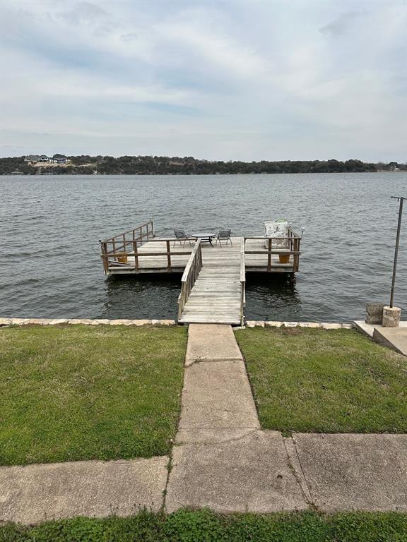 a view of a lake with a big yard