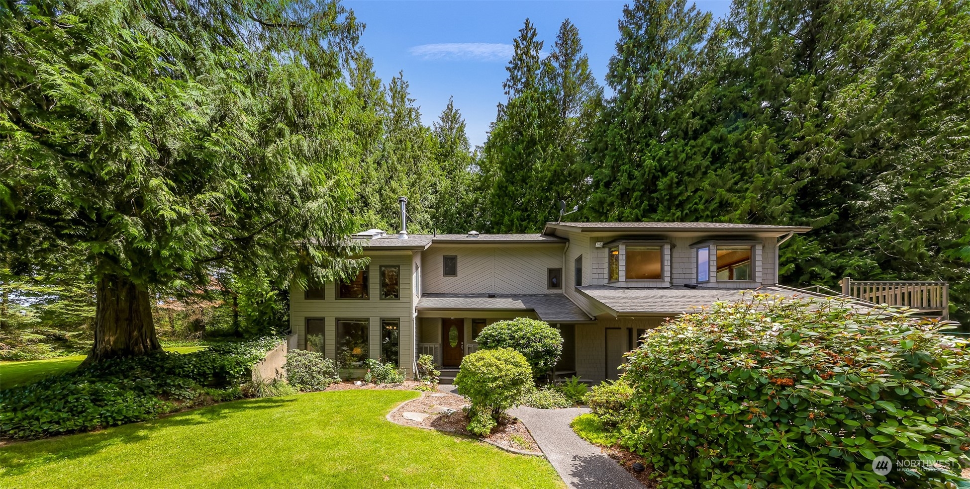 front view of a house with a yard