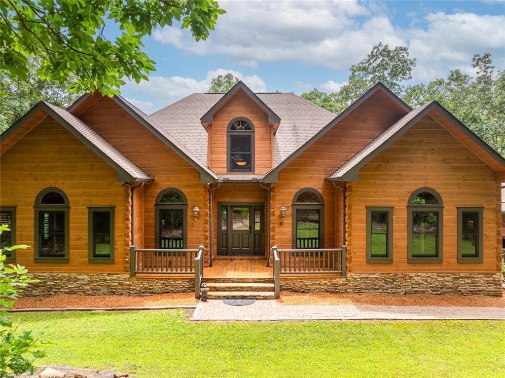 front view of a house with a yard