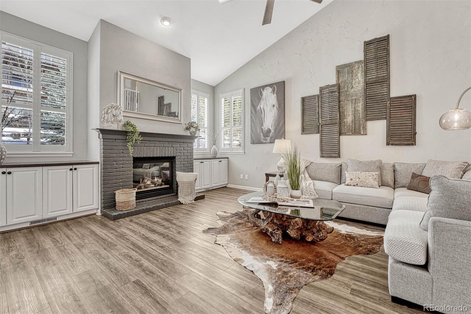 a living room with furniture or fireplace and a wooden floor