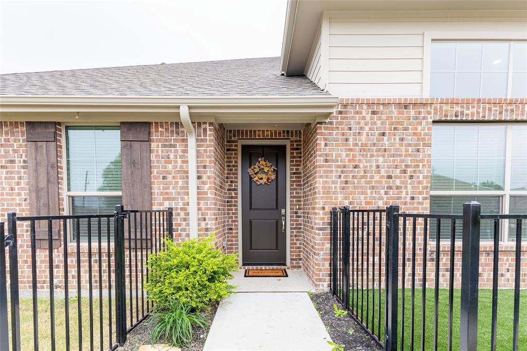 a front view of a house with a porch