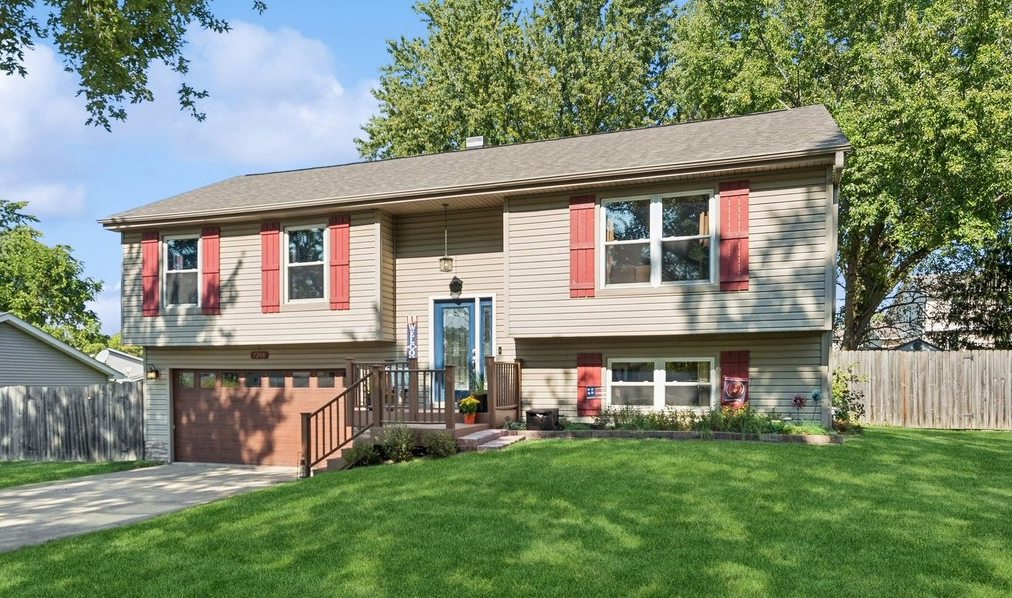 front view of a house with a yard