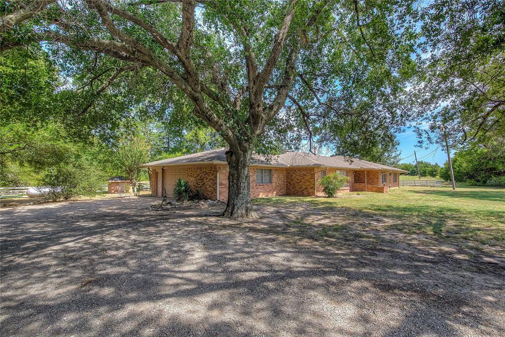 a house with trees in front of it