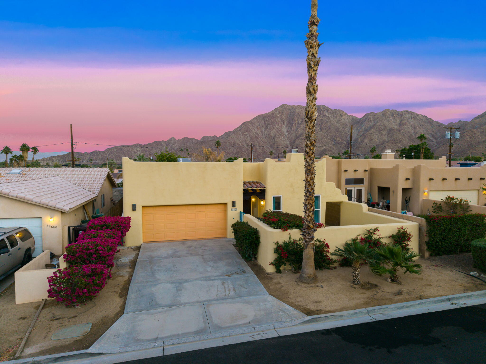 a front view of a house with a ocean view