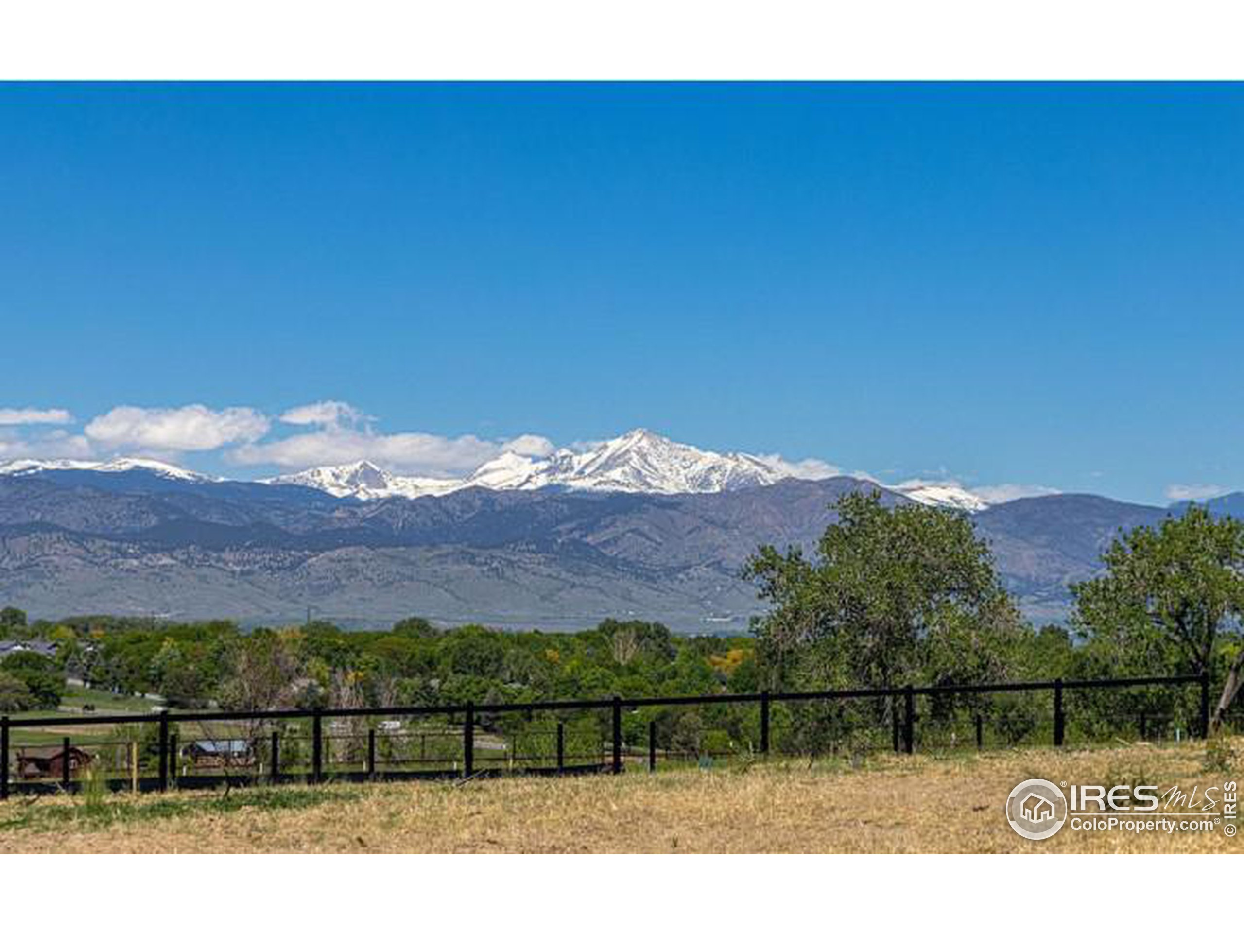 a view of a backyard with a mountain